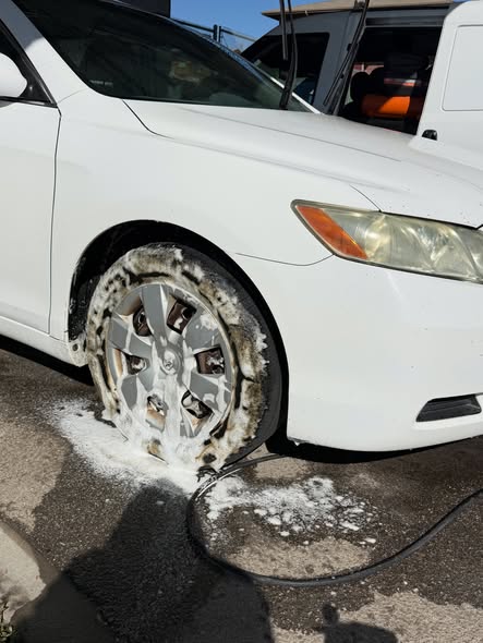 Clean wheel and dressed tire after a wheel and tire detail