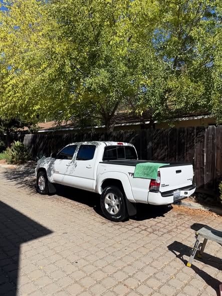 White Toyota Tacoma side view after a mobile detail