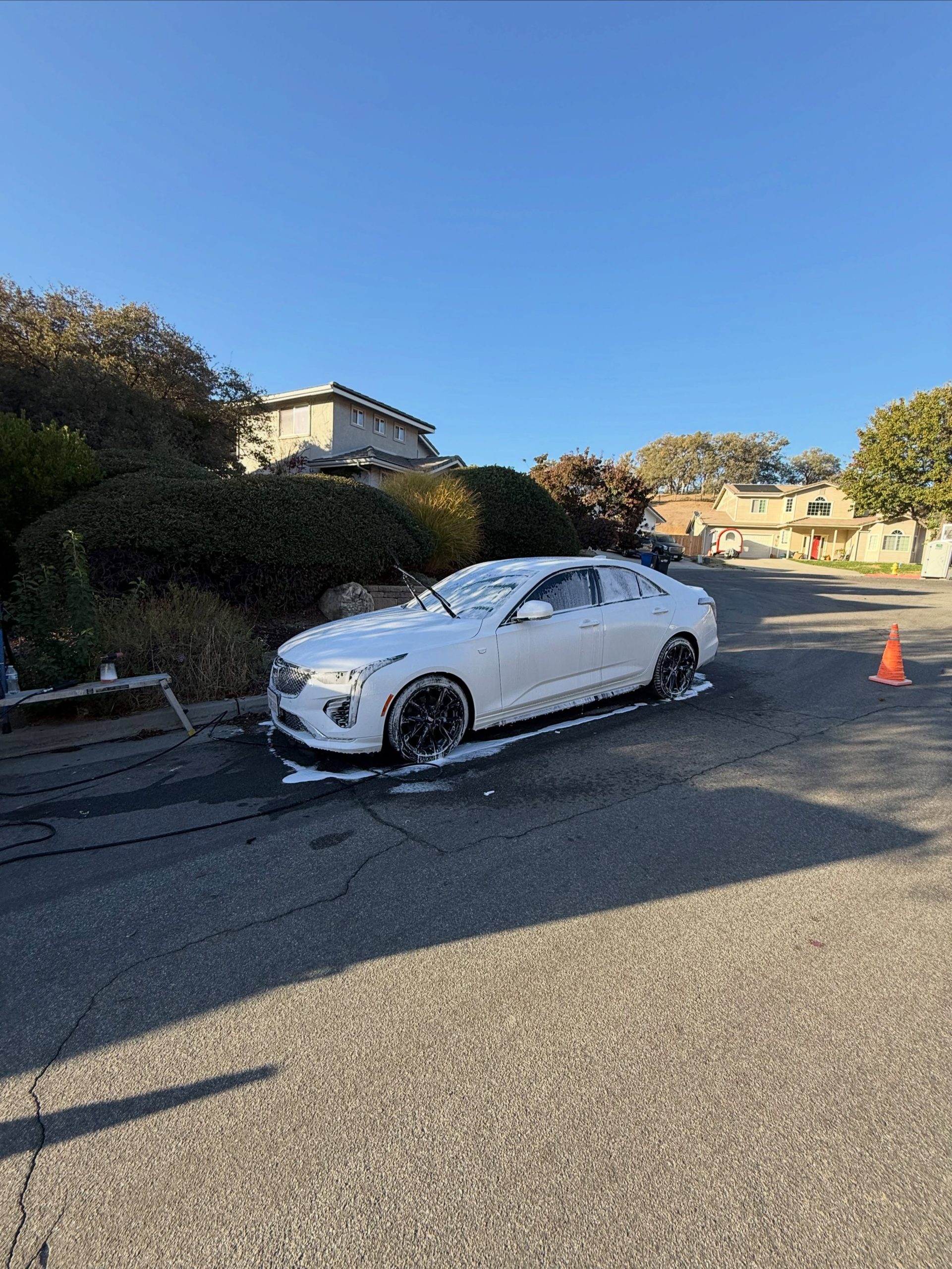 White Cadillac after a mobile exterior detail by Garcia's Mobile Detailing in Paso Robles